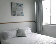 Bedroom 1 - Sleeps 2 with open Bath & Shower